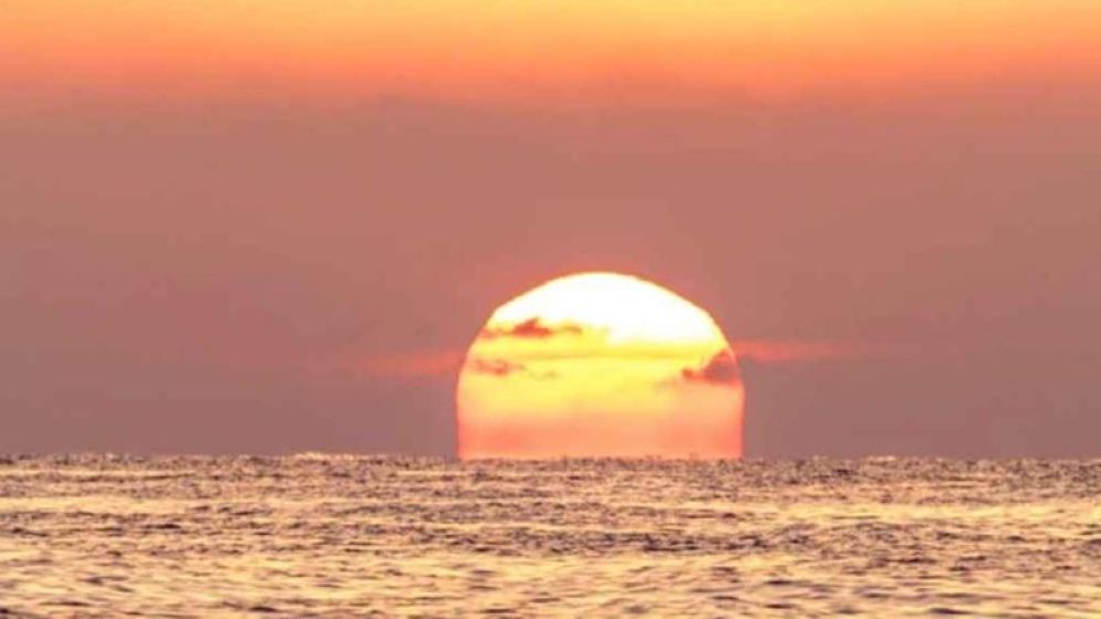 সূর্য কেন অস্ত যাওয়ার সময় কমলা বা লাল হয়